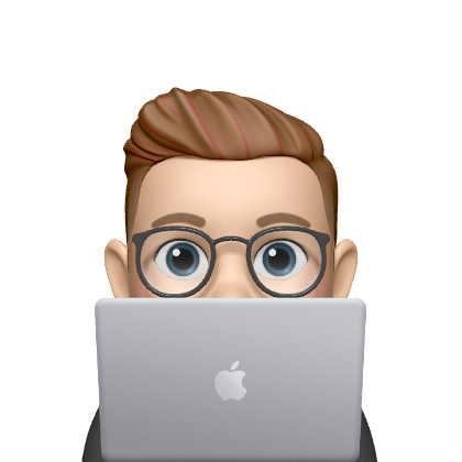 Person peeking from behind the laptop